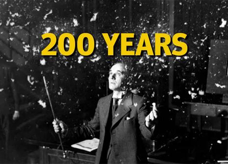 Alexander Oliver Rankine demonstrating a snowfall with ash. Text reads: 200 years