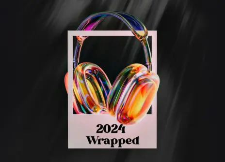 A pair of headphones on a black background with "2024 wrapped" written.