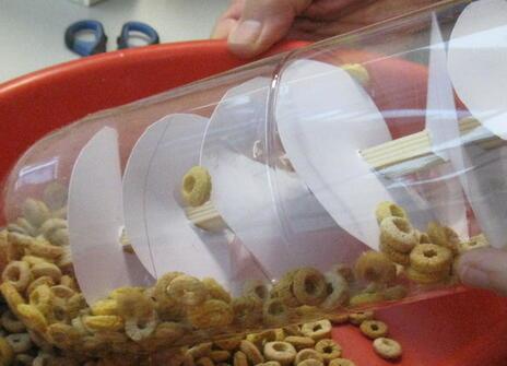 Students build an Archimedes screw at a 2013 Summer School