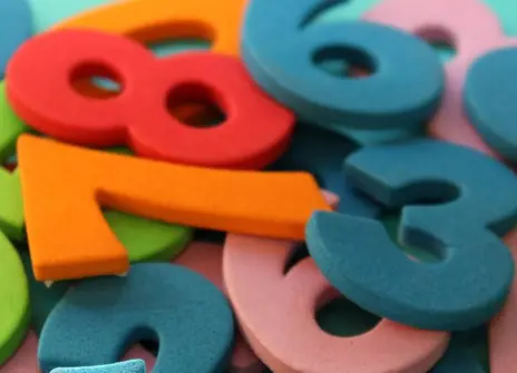 pile of colourful foam numbers