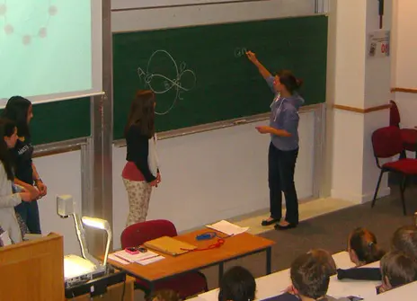 Students in Exeter giving presentations on their masterclass topics