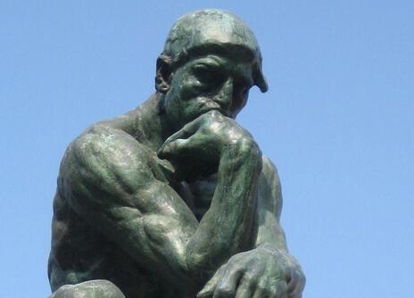 Statue of a man thinking