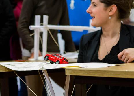 Masterclass speaker testing Year 9 students' bridges