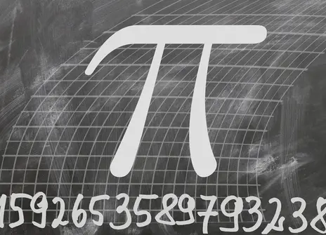 the letter Pi on a chalkboard with the numeric value of Pi underneath up to the 23rd decimal point