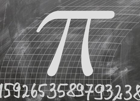 the letter Pi on a chalkboard with the numeric value of Pi underneath up to the 23rd decimal point