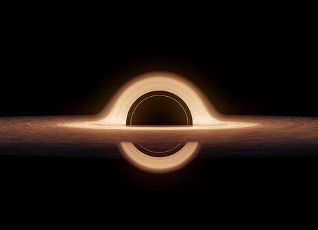 A stylised image of a black hole in space.