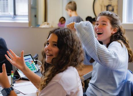 Image of two girls cheering