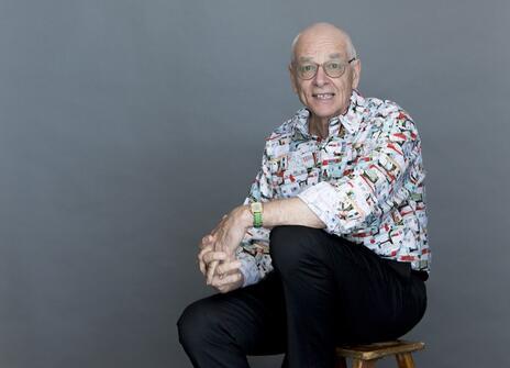 Dr Karl squatting for a photo