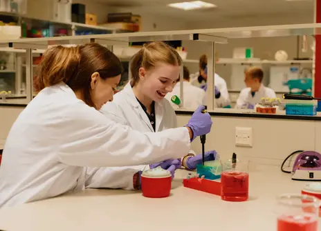 Two participants enjoying the forensics workshop