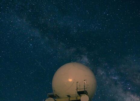 A UFO with a backdrop of stars