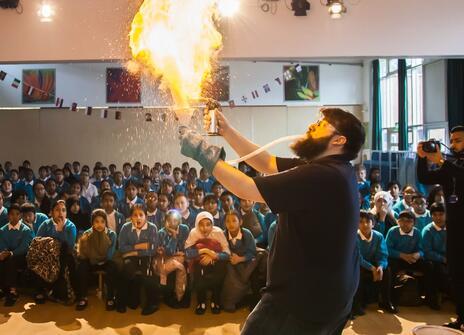 A firey science demonstration in a schools talk