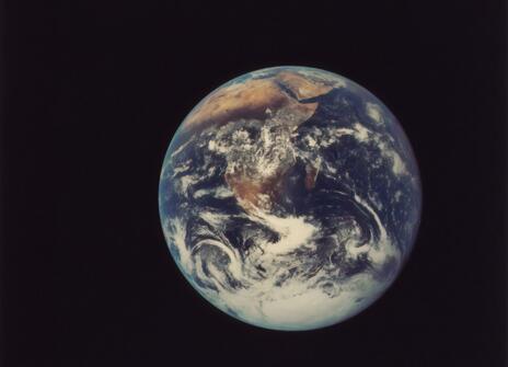 A picture of the Earth in space. 