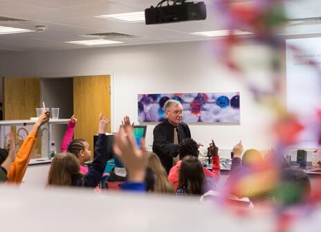 Children and a teacher in a classroom