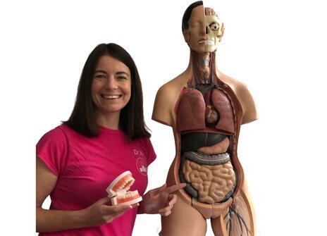 Dr Jo and a plastic cutaway model of a human