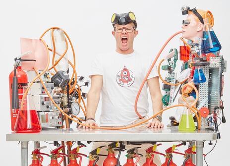 Stefan Gates surrounded by equipment
