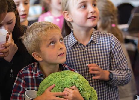 Image of child holding a soft toy