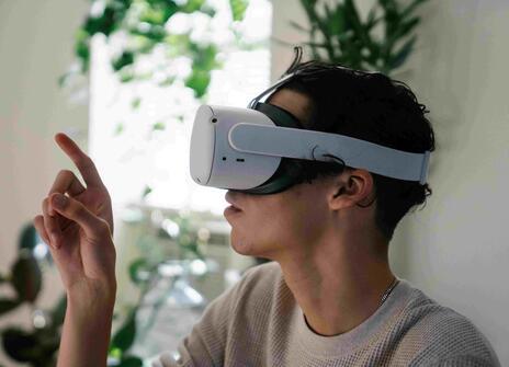 A man wears a virtual reality headset