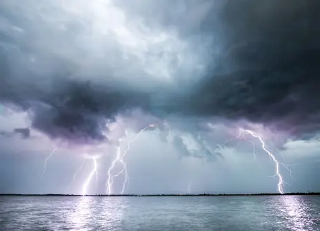 Dark cloud and thunder storm over the ocean
