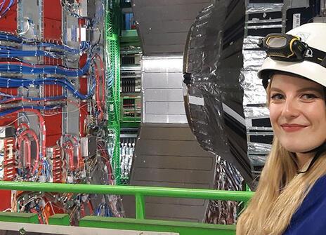 Kathryn in front of the CMS detector during training to become a tour guide