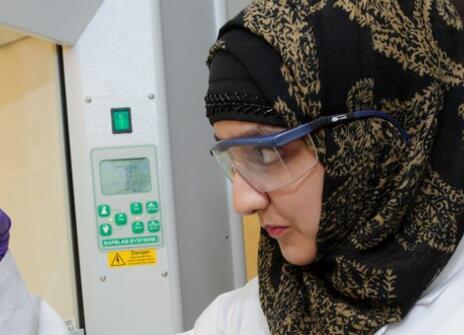 Noor taking part in a Spectacular Colour Chemistry workshop
